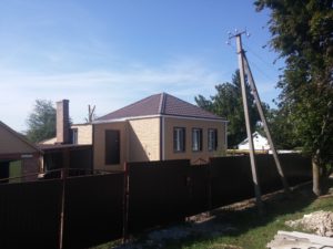 сайдинг под кирпичь вместе с кровлей